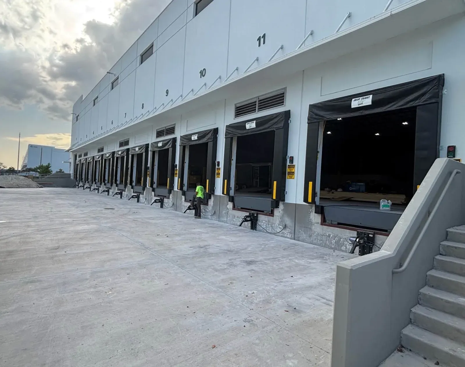 A new row of loading-dock doors on a warehouse