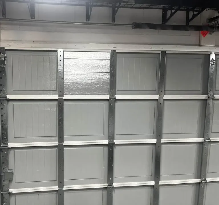 A new insulated garage door, seen from inside