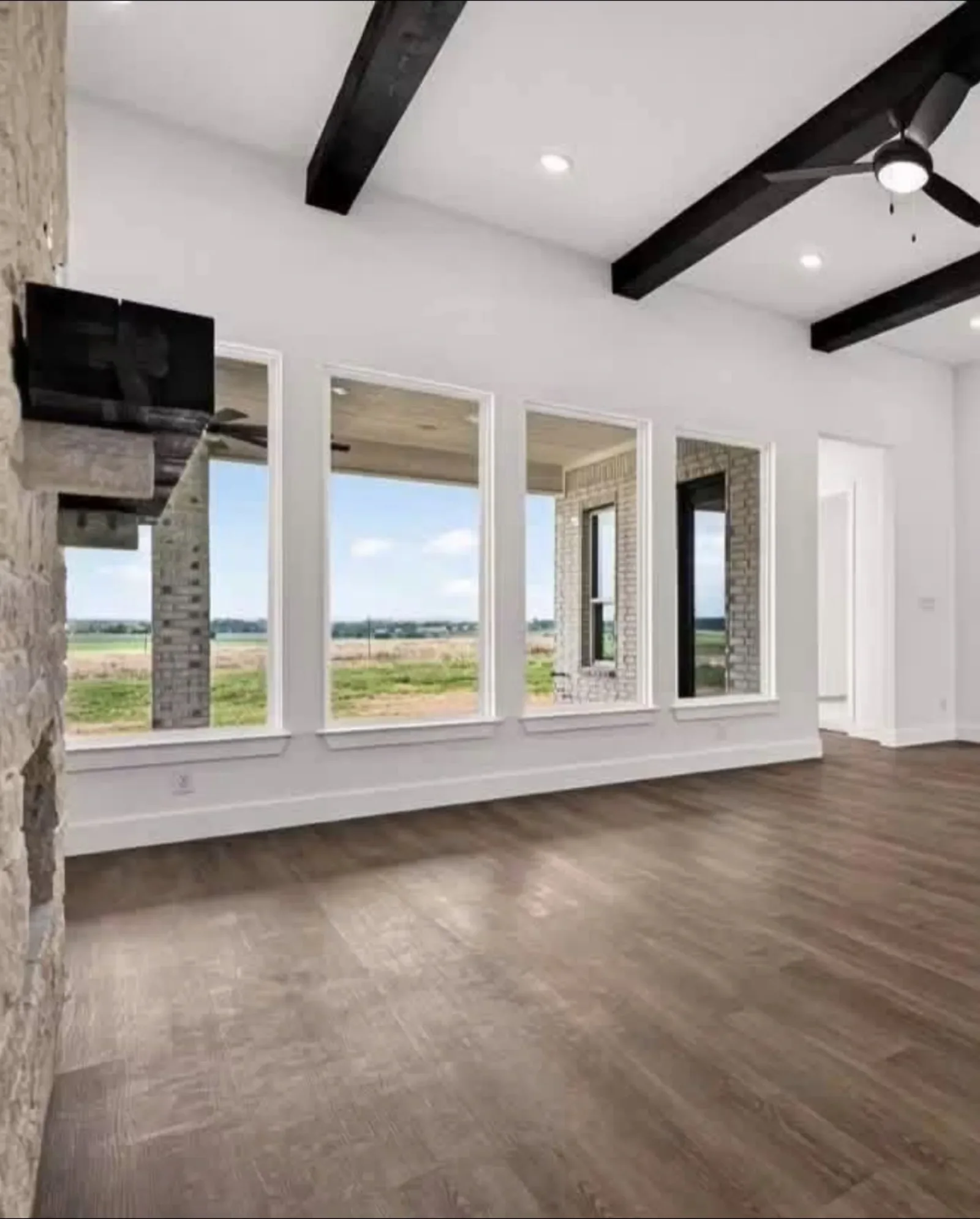 A room with a wall of new windows